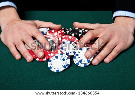 Group of chips on the green cloth.