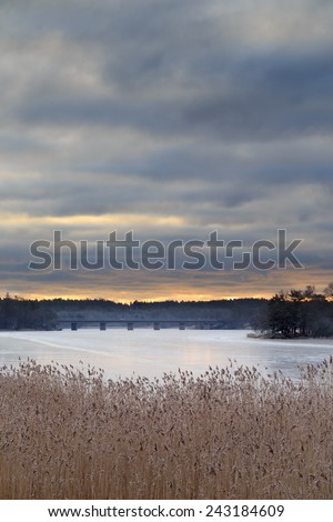 Sunrise over frozen lake Magelugnen in Farsta in Stockholm, Sweden