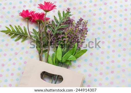 Still life art photography with bouquet in paper bag   Save to a Lightbox?     Find Similar Images    Share? Still life art photography with bouquet in paper bag