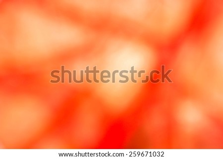 Abstract background of red and green blurred by camera