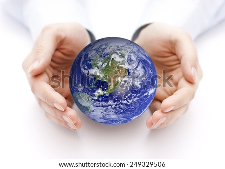 Earth in hands. Earth image provided by Nasa.