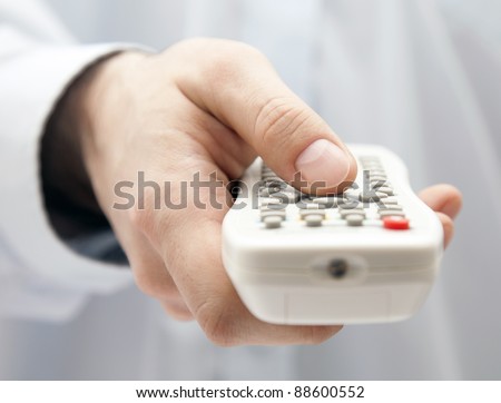 Tv remote control in hand