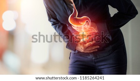 Woman touching stomach painful suffering from stomachache causes of menstruation period, gastric ulcer, appendicitis or gastrointestinal system disease. Healthcare and health insurance concept