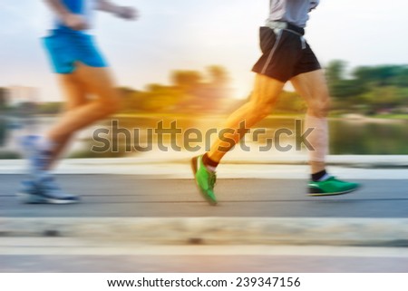 abstract colorful people running in the park, pastel and blur concept