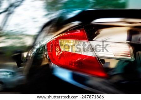 abstract a car driving at speeds in the street city, soft and blur concept