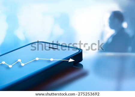 Abstract mobile phone and graph chart growth on screen and business man background, blue tone style