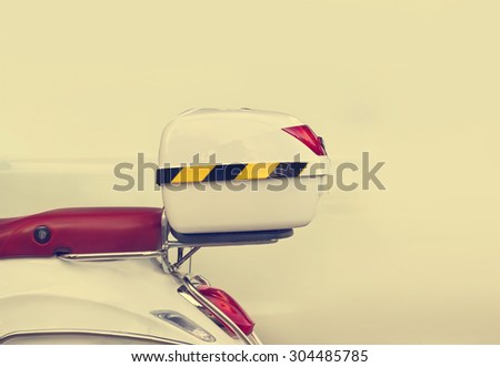 white box on back of motorcycle, Vintage color tone style