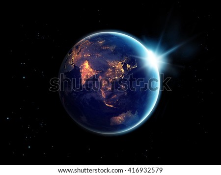 City lights at night in planet earth with sun rising, Elements of this image furnished by NASA