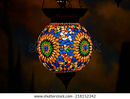 colorful stained glass Turkish lantern in dark background