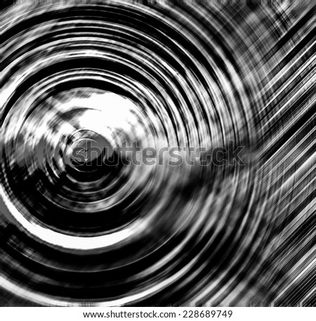 Abstract background of spin circle radial motion blur in metallic effect