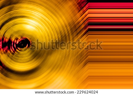 Abstract background of spin circle radial motion blur in metallic yellow gold  and red tone stripe