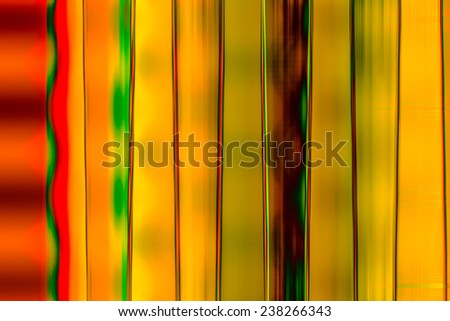Abstract background  with wave effect and horizontal motion blur with current in black,  yellow, orange, red, green, and brown
