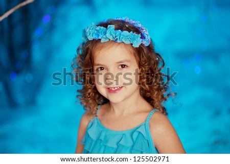 Little and cute winter fairy tale girl