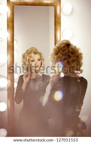 Beauty luxury woman with  and mirror