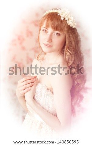 A beautiful young woman in vintage lace dress
