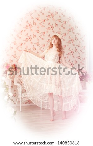 A beautiful young woman in vintage lace dress