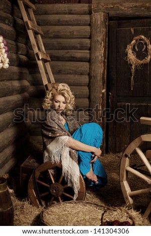 Young beautiful woman in a rural village