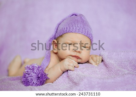 Baby sleeping. Newborn, kid art. Beauty child, boy or girl sleeps in a funny hat