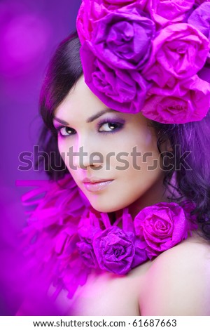 The image of a beautiful girl in a hat with roses
