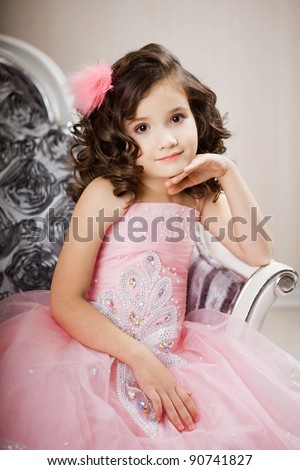 Beautiful Baby Girl Clothes on Stock Photo   A Beautiful Girl  A Child On A Chair In A Nice Dress