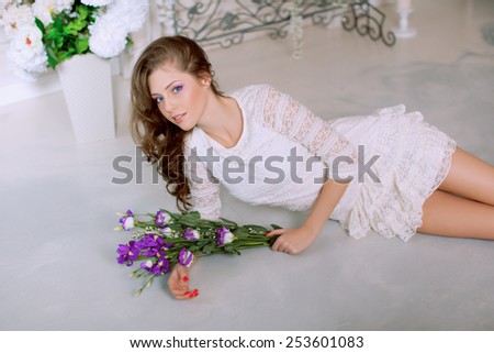 Young spring fashion woman in spring lux vintage interior. Springtime. Trendy girl on a luxury spring background. Allergic to pollen of flowers. Spring allergy