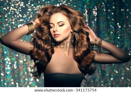 Long hair. Waves Curls Hairstyle. Hair Salon. Updo. Fashion model with shiny hair. Woman with healthy hair girl with luxurious haircut. Hair loss Woman with hair volume.