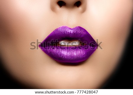 Red woman lips, mouth close up. Beautiful model girl with lipstick plum wine color. Products Treatment.
