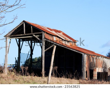 Old ruined barn on the point of falling down