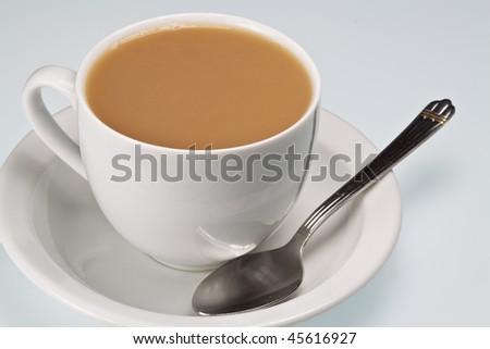 stock-photo-white-china-cup-of-tea-with-milk-and-teaspoon-on-a-plain-background-45616927.jpg