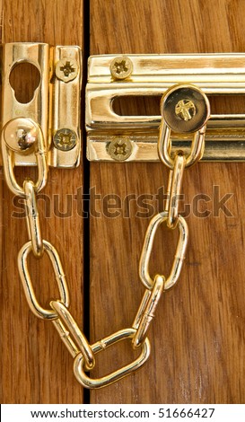Close up of a security door chain