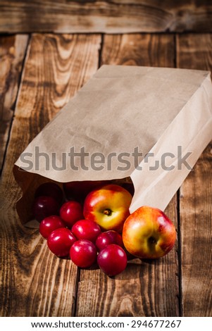 fruit in the package on a wooden background