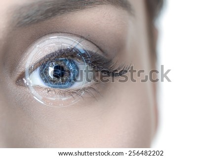 Close-up of woman\'s eye. New technologies concept