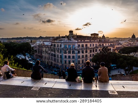 Rome, Italy - 1 April 2014 - People enjoying the sunset in Rome, Italy.