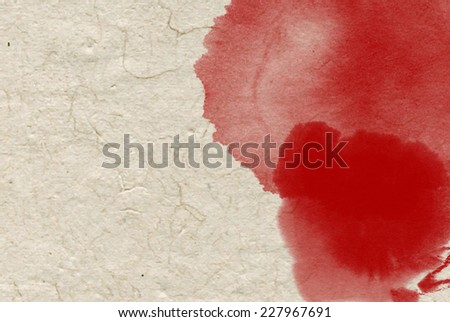 Chinese red ink on simple rice paper texture background