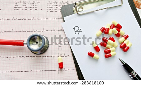 Stethoscope on EKG graphs, drug distribution on the prescription\
Medical concept