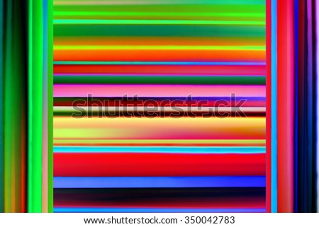 Abstract stripy background composition in rainbow / spectral colors resembling open sliding doors and neon glow behind them or window with jalousie / louvers / blinds.
