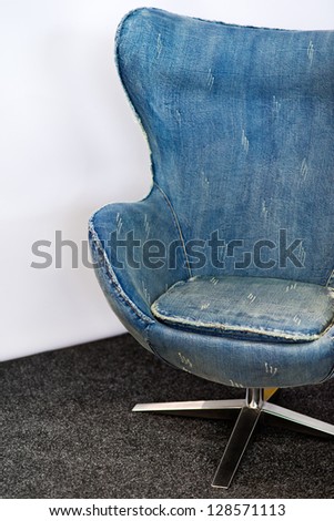 Famous egg chair, originally designed by Arne Jacobsen, in blue jeans color