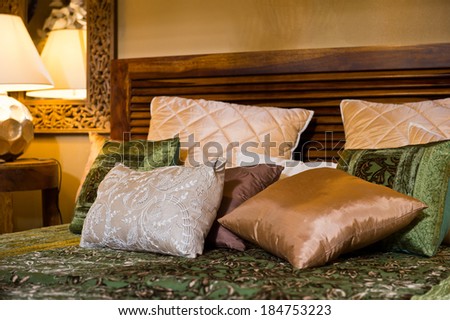 Set of cushions on the bed