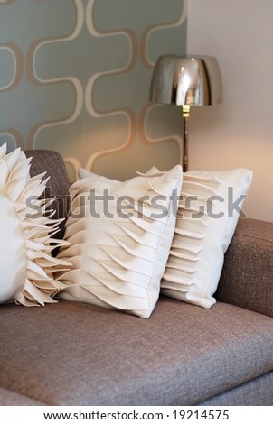 Modern designed sofa in blue and beige color