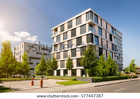 Modern block of flats with blue sky, a place to live in the city