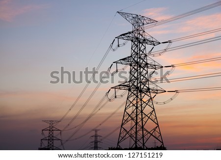 High voltage towers. High voltage power electric transmission towers of a power plant to the substation.