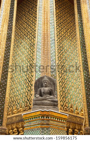 Buddha temple wall. Glass art in Thailand. Patterned walls of the temple.