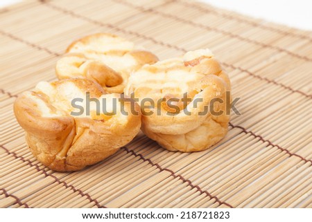 Loaf of bread on wooden plate.pack-shot in studio.