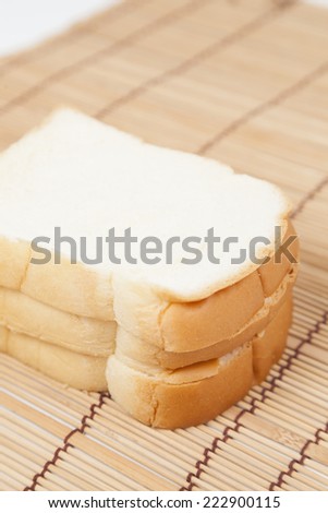Sliced Ã?Â¢??Ã?Â¢??bread on the wooden plate.pack-shot bread in studio.