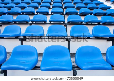Blue chair. On the miraculous. To watch a sporting event.