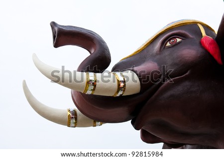 Three-headed elephant statue. Hindu religious expression. Religious identity.