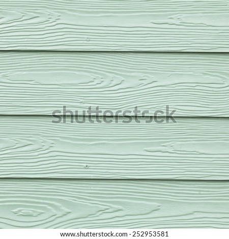 Wall is wood. Green wall of floor, wall trim.