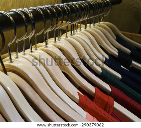 row of hanger with shirt,photo under tungsten light