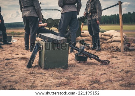 Ammunition box on the ground with machine gun case