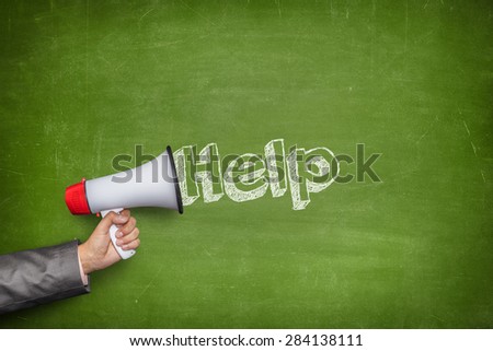 Help text on blackboard and Businessman hand holding megaphone on front of vintage full frame black blank blackboard no frame